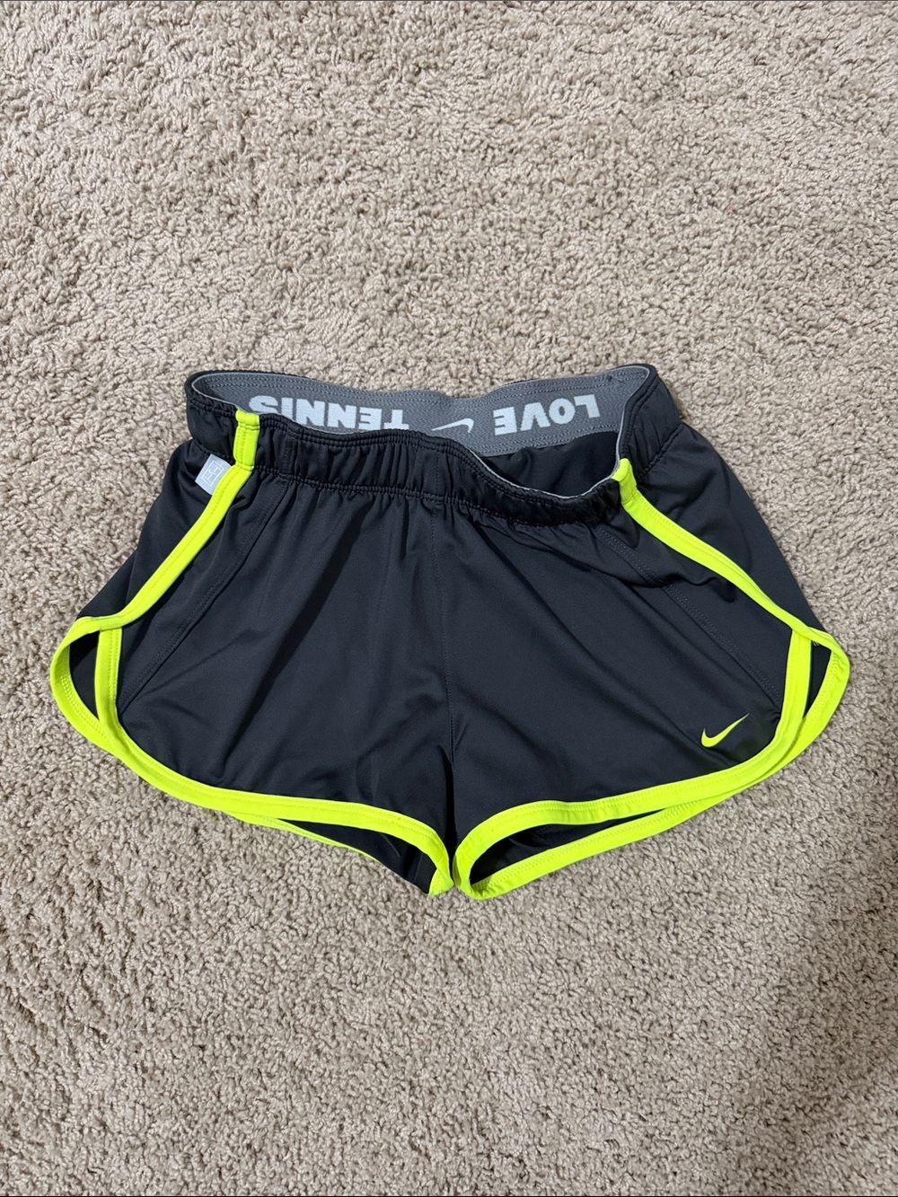 Nike Women’s Black Athletic Shorts with Neon Yellow Trim